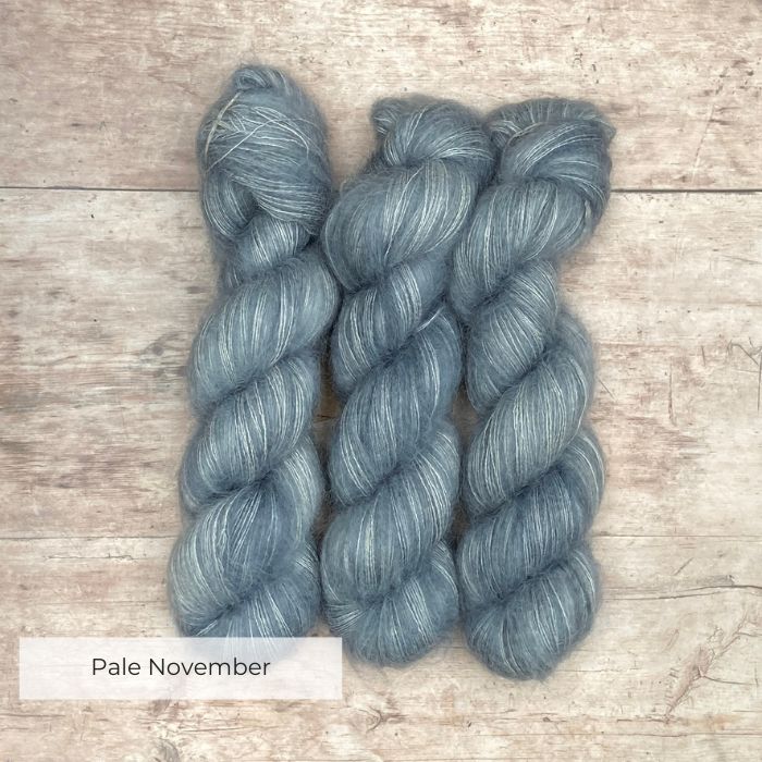 Three skeins of mohair & silk lace in a pale grey blue