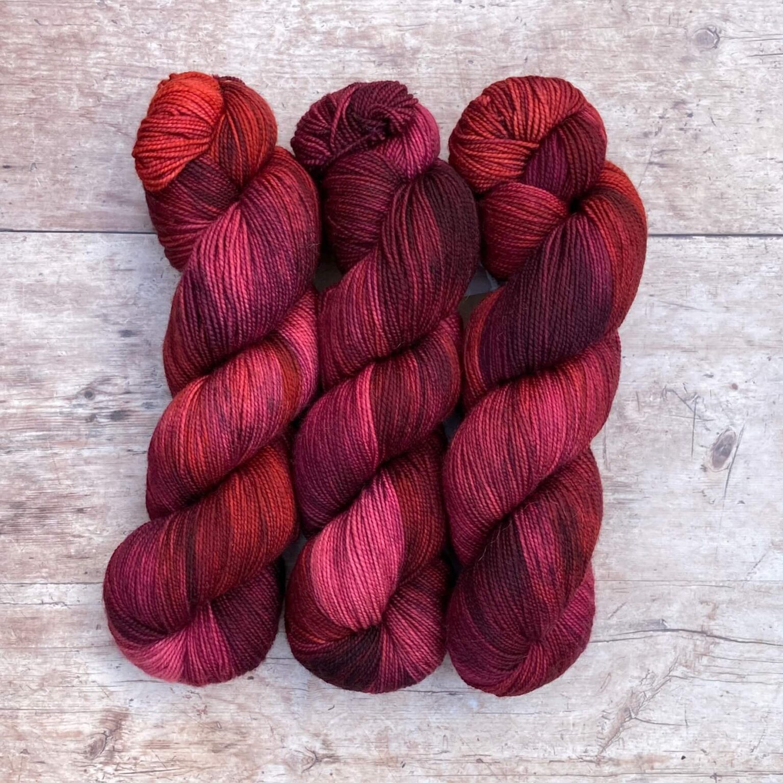 Deep red and pink variegated Classic Sock yarn