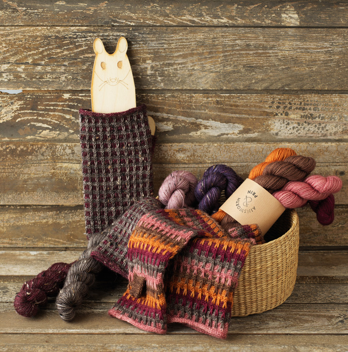 Mittens and wool in a basket