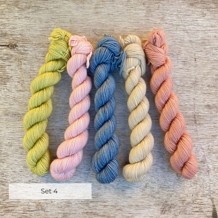 Five mini skeins of sock wool in pastel colours