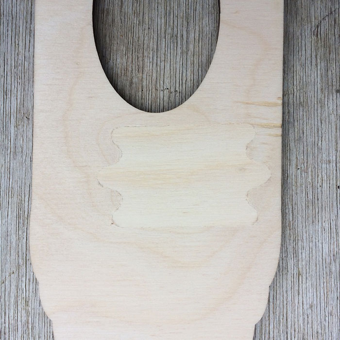 The back of a bunny blocker showing the plug used to fill a fault in the wood