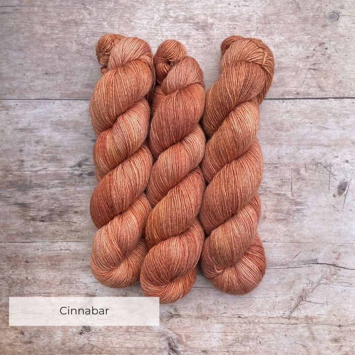 Two skeins of Merino & Silk in a pale terracotta