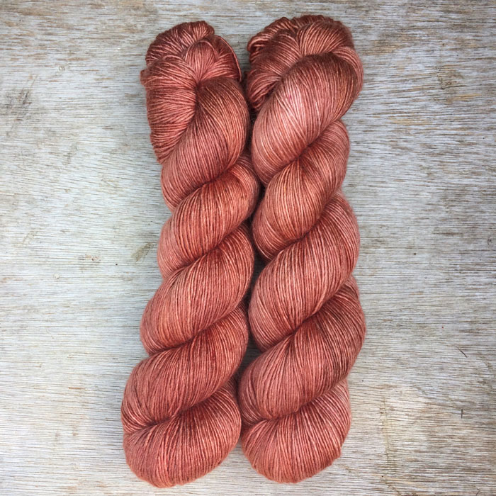 Two skeins of terracotta yarn