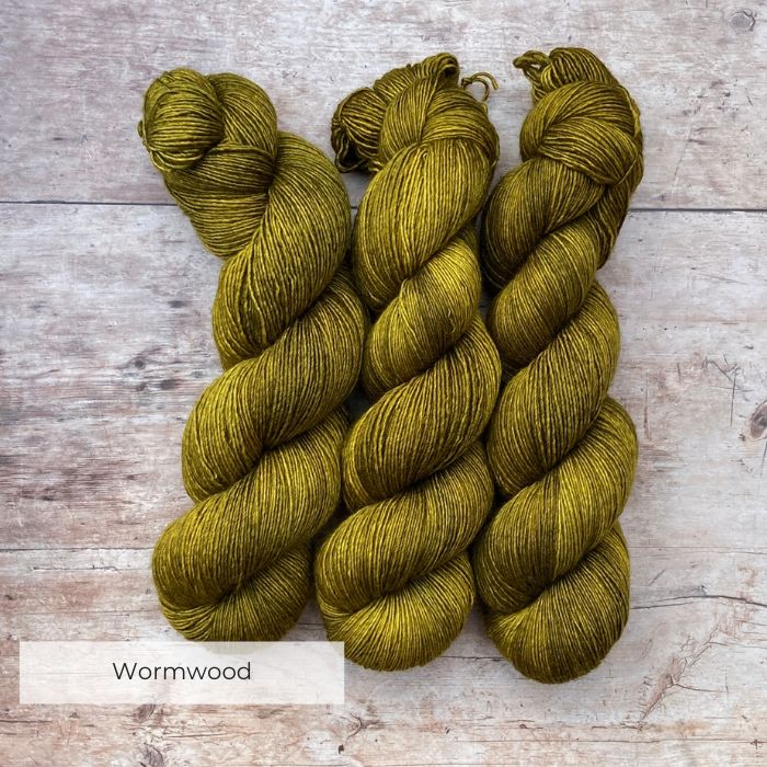 Three skeins of Merino Silk in a yellow green khaki