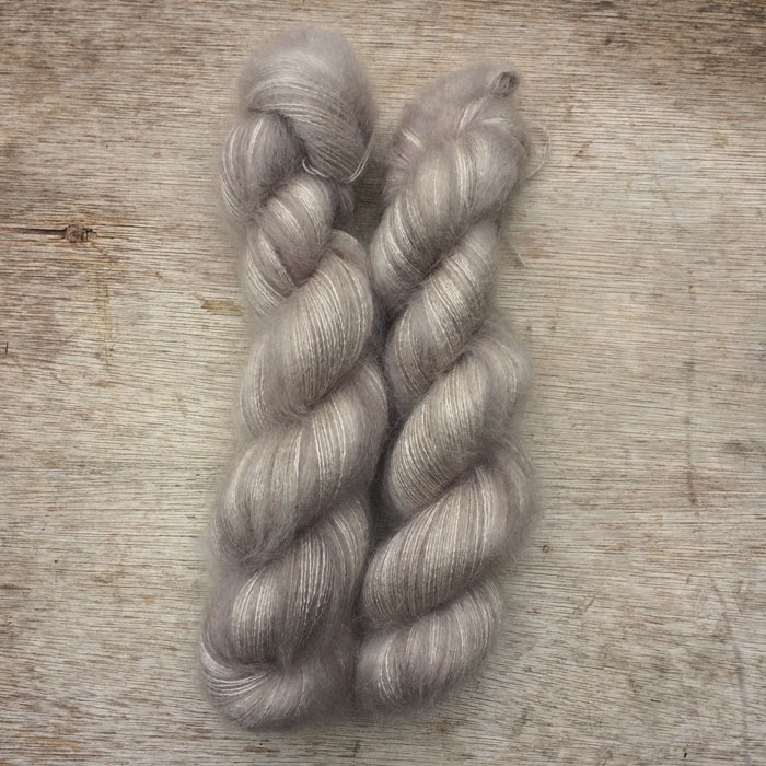 Two plump skeins of soft grey mohair and silk