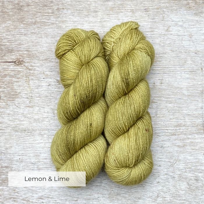 Two plump skeins of pale lime green yarn