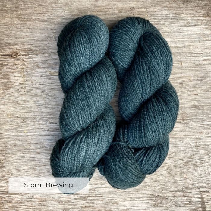 Two Skeins of yarn the colour of the deep sea