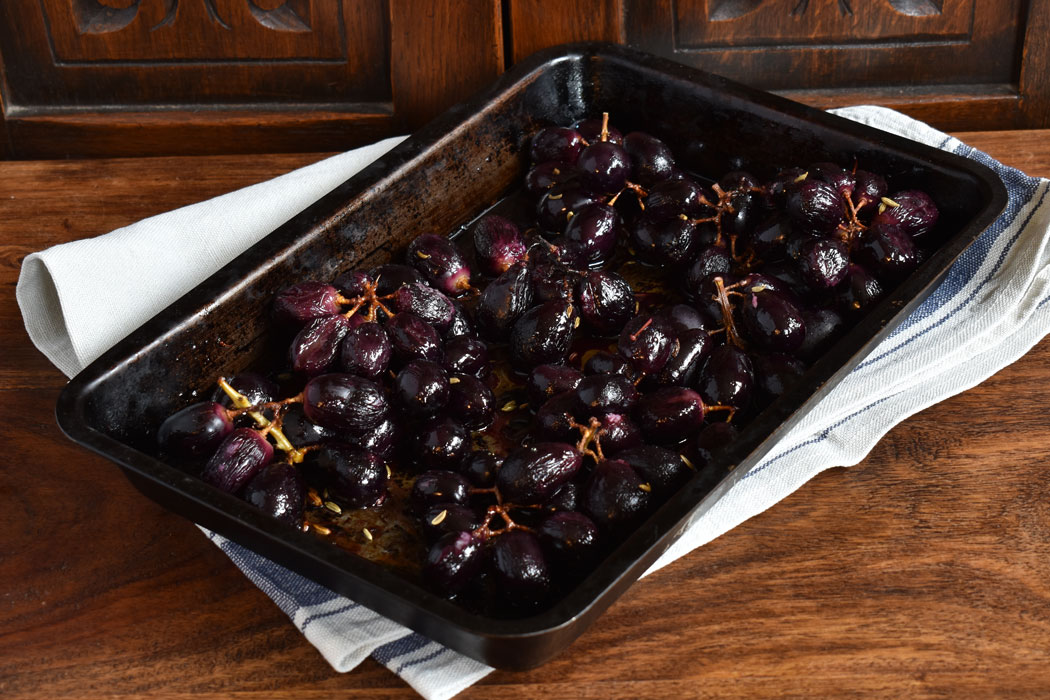 A tray of roasted grapes