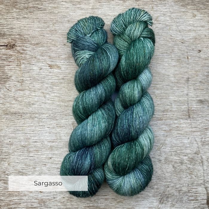 Two skeins of silky yarn in all the colours of the sea