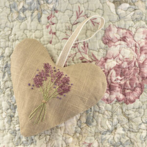 A heart shaped embroidered lavender bag