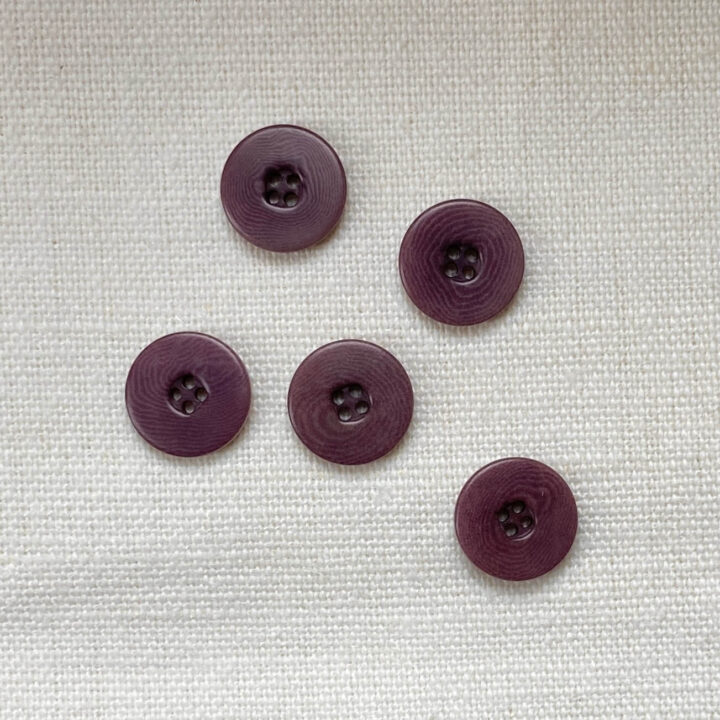 5 four hole dusty plum corozo buttons with flat rim