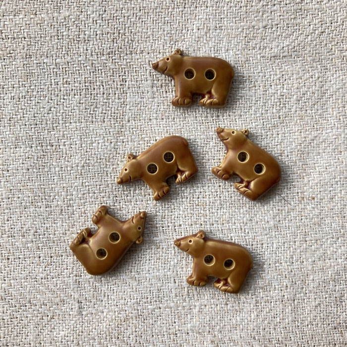 Five brown bear buttons