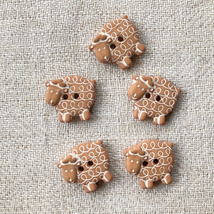 Five brown sheep buttons
