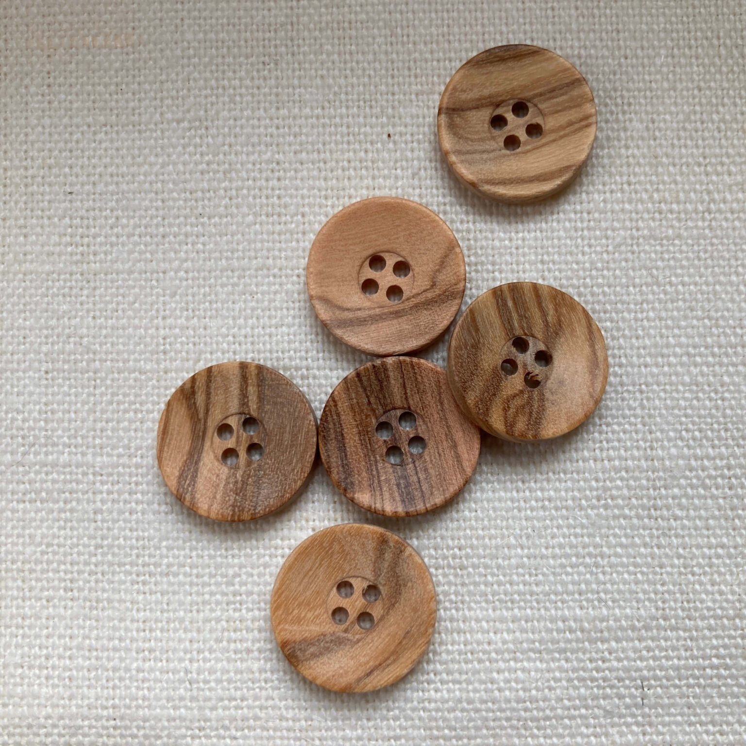 6 four hole slightly concave olive wood buttons