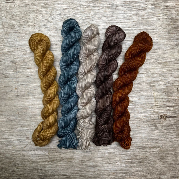 Five little mini skeins in rust, chocolate, stone airforce and gold