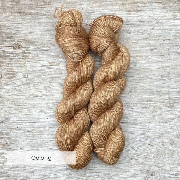 Two skeins of warm caramel coloured yarn