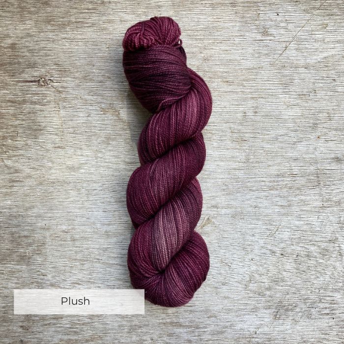 yarn in the colour of faded burgundy and plum