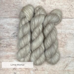 Two plump skeins of soft grey mohair and silk lace