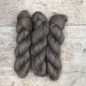 Three skeins of mink coloured mohair and silk lace