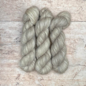 Two plump skeins of soft grey mohair and silk lace