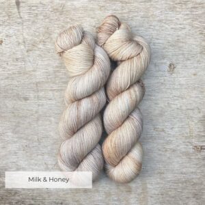 Three skeins of Classic Sock in buttercream, coffee and gold