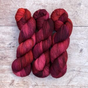 Deep red and pink variegated Classic Sock yarn