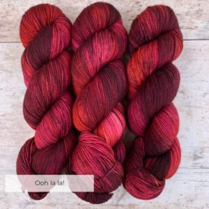 Deep red and pink variegated Classic Sock yarn