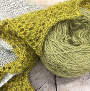 A close up of the edging of the shawl to compare the difference in colour.