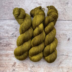 Three skeins of Merino Silk in a yellow green khaki