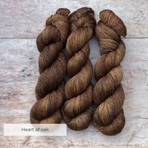 Three skeins of Merino & Silk in a rich deep brown