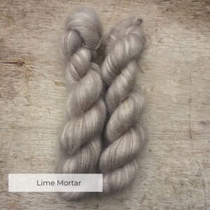 Two plump skeins of soft grey mohair and silk