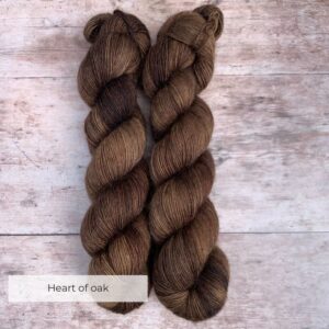 Two skeins of Merino Floofin a rich deep brown