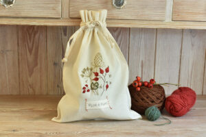 A plump embroidered cotton work bag