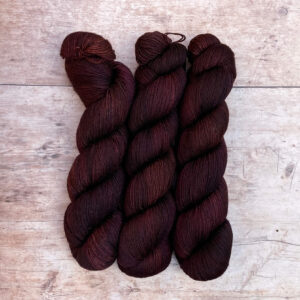 three skeins of Mohair sock wool in brown, dusty pink and bronze