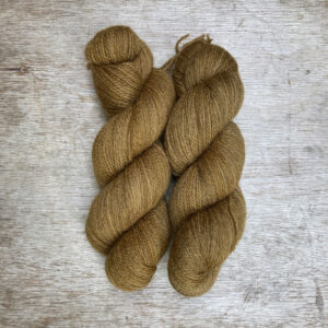 Two fat skeins of deep golden yarn