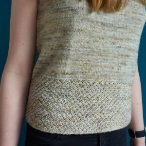 lose up of the deep hem of the top