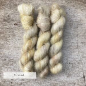 Three skeins of pale creamed mink mohair lace