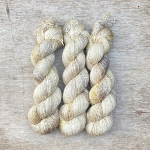 Three skeins of silky in cream and cafe au lait