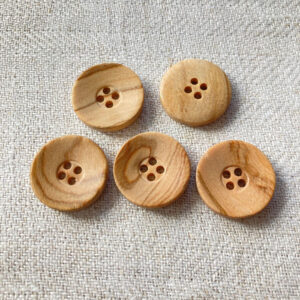 Five polished wood natural buttons