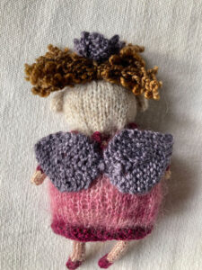 back of the fairy with wings, hair and crown in place