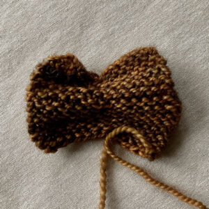 a lightly gathered square of knitting