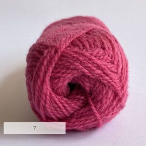 The end of a ball of wool in a deep pink
