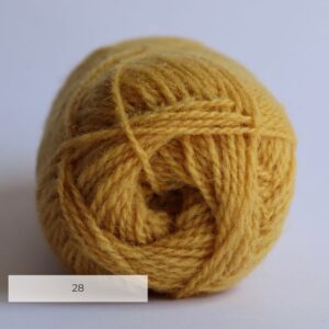 The end of a ball of wool in a old gold