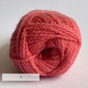 The end of a ball of wool in coral