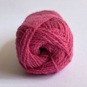 The end of a ball of wool in a deep pink