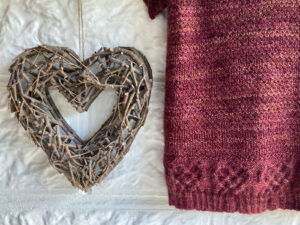 The heart hem detail on a knitted jumper