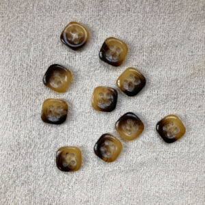 Ten small square imitation tortoise shell, four hole buttons