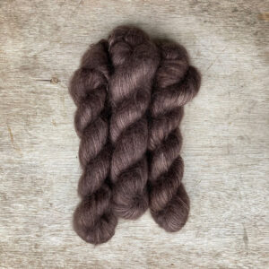 Three skeins of mohair lace in a deep rich brown
