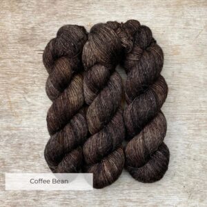 Three skeins of merino and linen in a in dark brown and grey