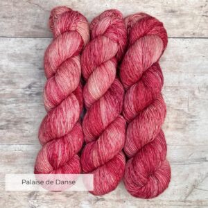 Variegated Flax yarn in mid to deep pink